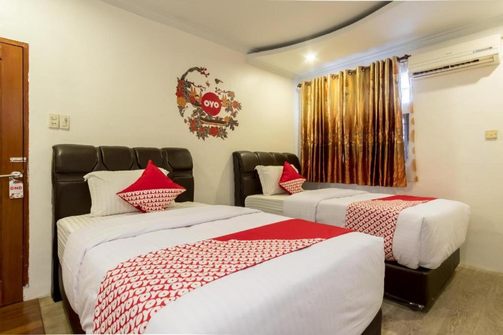 Oyo 619 Naufal Guest House Syariah Medan Extérieur photo
